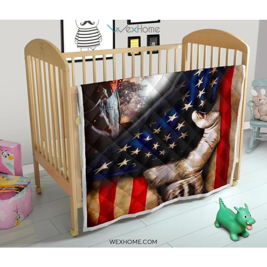 Welder Hand Pulling American Flag Quilt