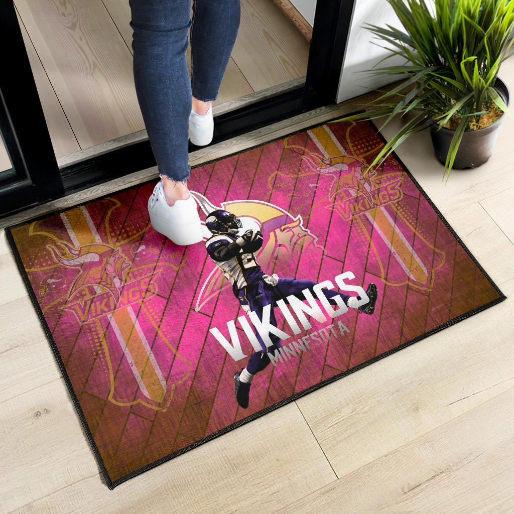 Minnesota Vikings American Football Team Door Mat Adrian Peterson Jumping Symbol On Pink Wall Background Door Mat Home Decor