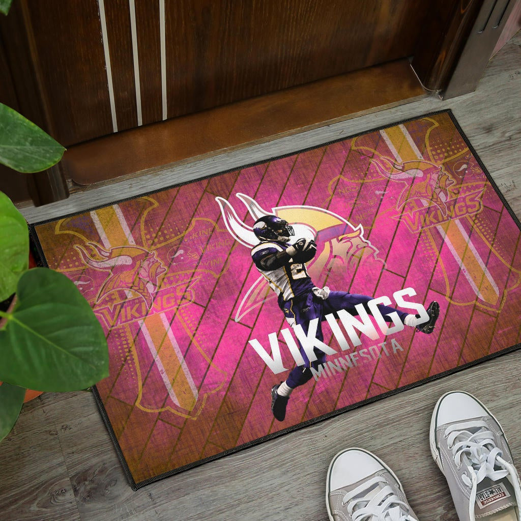 Minnesota Vikings American Football Team Door Mat Adrian Peterson Jumping Symbol On Pink Wall Background Door Mat Home Decor
