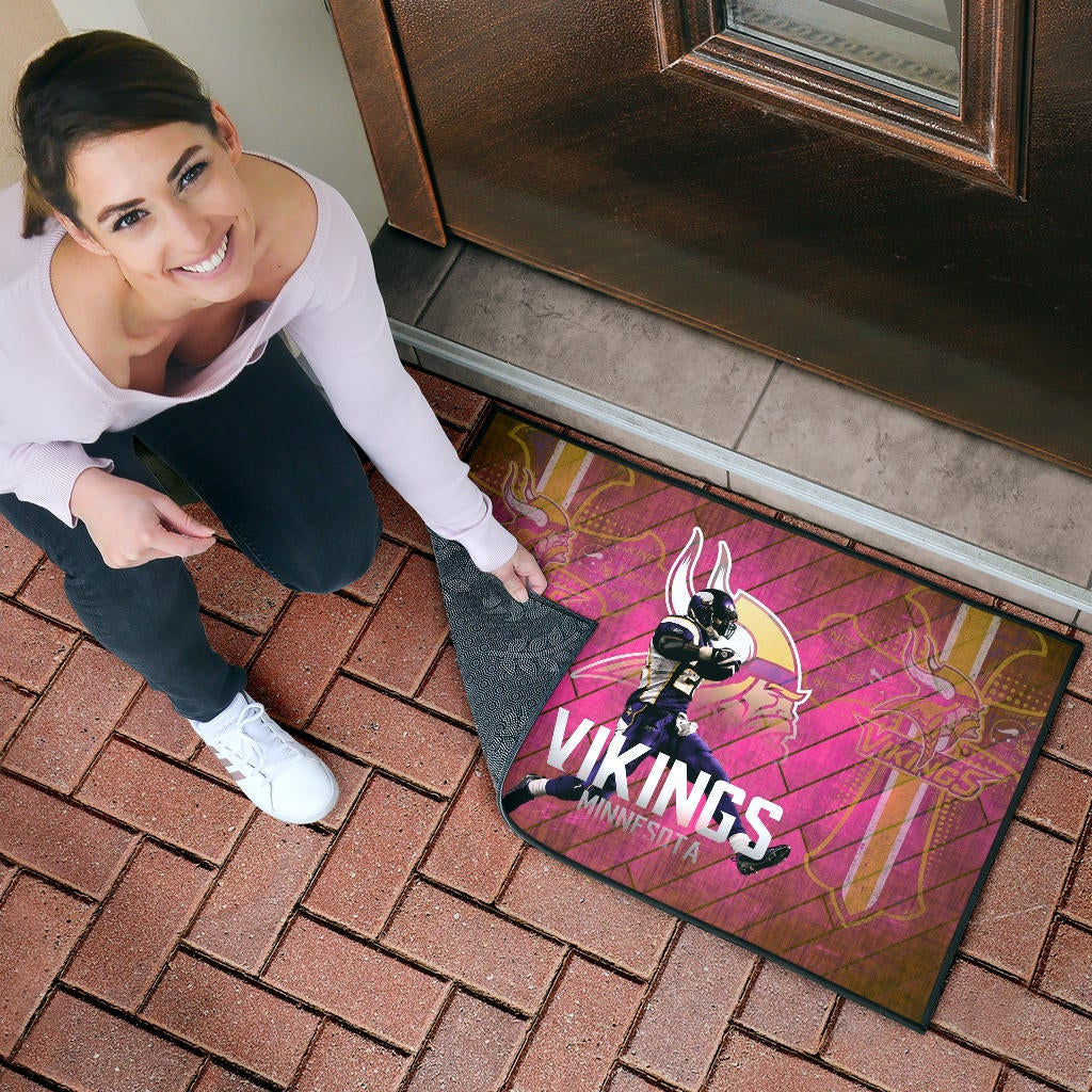 Minnesota Vikings American Football Team Door Mat Adrian Peterson Jumping Symbol On Pink Wall Background Door Mat Home Decor
