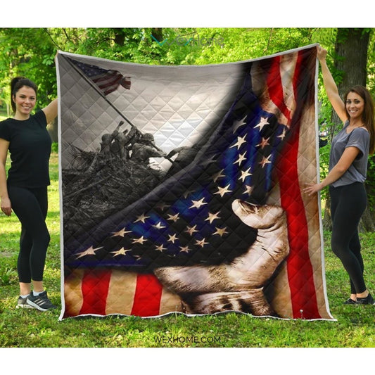 US Veteran Hand Pulling American Flag Quilt