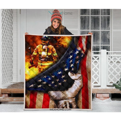 Firefighter Hand Pulling American Flag Quilt