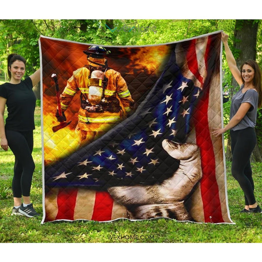 Firefighter Hand Pulling American Flag Quilt