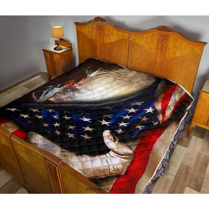 Welder Hand Pulling American Flag Quilt