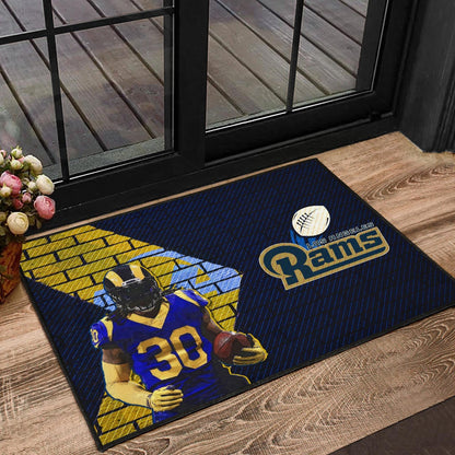 Los Angeles Rams American Football Raymond Calais 30 Holding Rugby Ball Brick Background Door Mat Home Decor